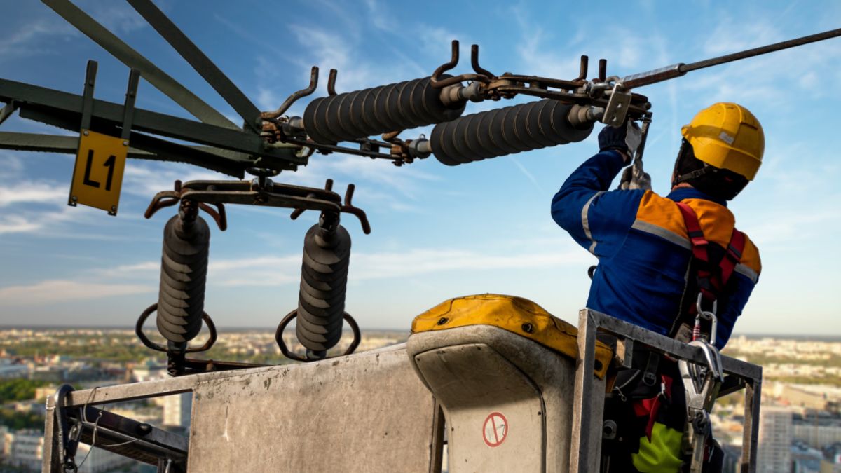 Worker working on powerline.
